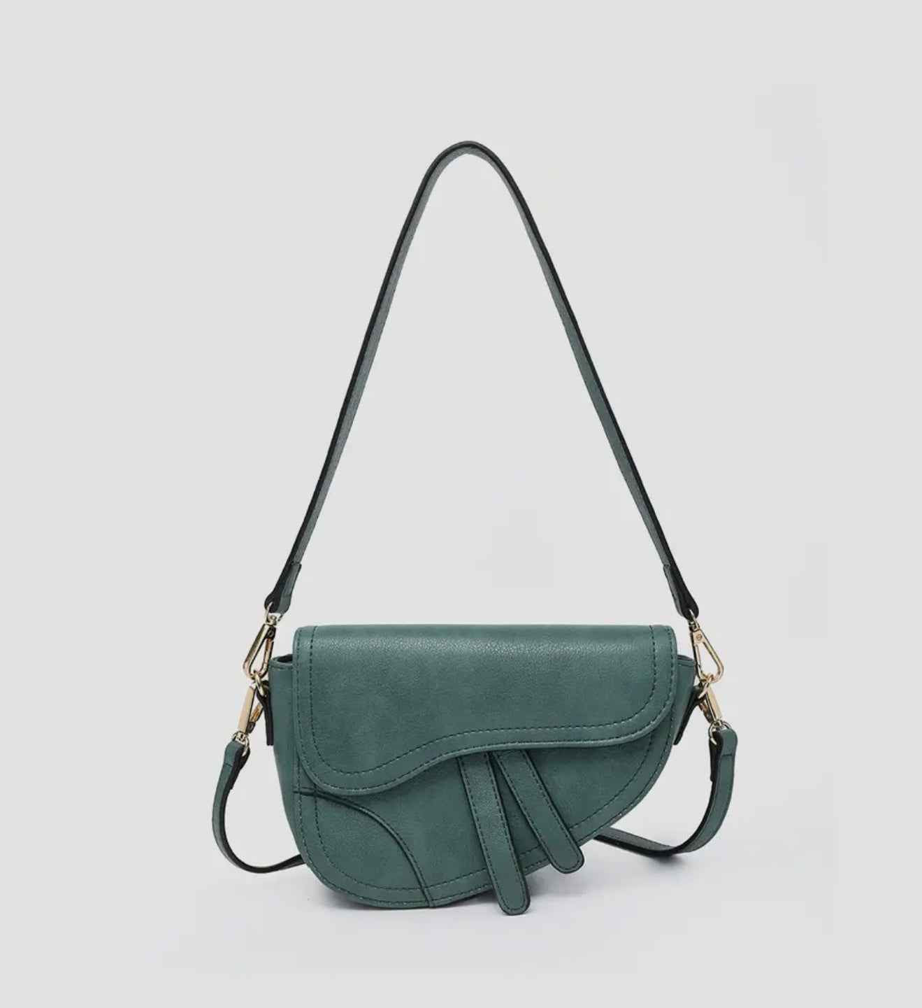 Asymmetrical cross-body saddle bag