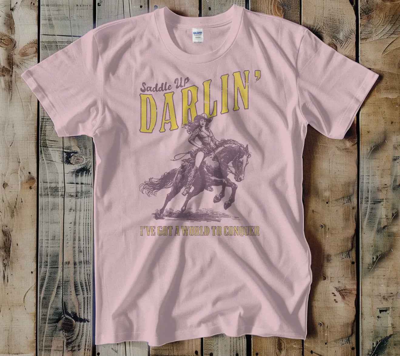Saddle Up Darlin’ I’ve got a World to Conquer Tshirt