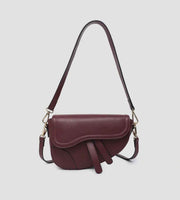 Asymmetrical cross-body saddle bag